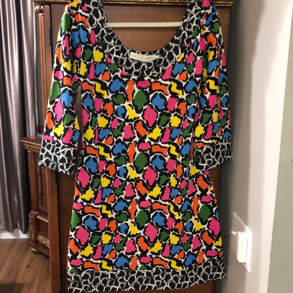 Tracy Negoshian dress.